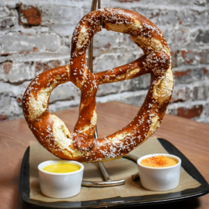 a giant pretzel hanging on a hook