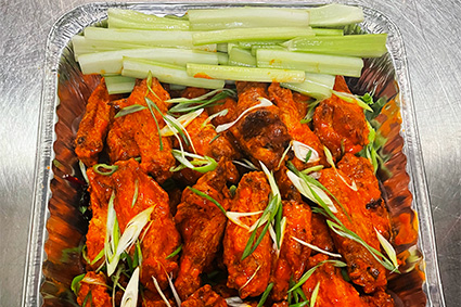 Buffalo wings and celery from our food caterers near Greenwich Village, New York City.